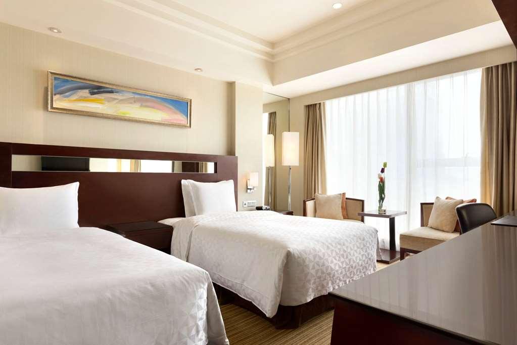 Hotel Ramada Plaza Lianyungang Chambre photo